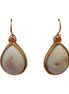 Off white teardrop shaped earrings