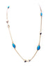 Long gold chain necklace with turquoise pentagon shapes