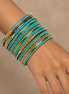 Indian Style 16-Piece Turquoise & Gold Tone Bangle Bracelet Set – 2.6" Diameter | Stackable Boho Ethnic Bangles for Women #BNG-20444TQ