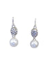 Crystal ball with dangling pearl earrings
