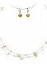 Sleek metal bubbles make lovely stations on this necklace. Give delicate beauty to your look!
