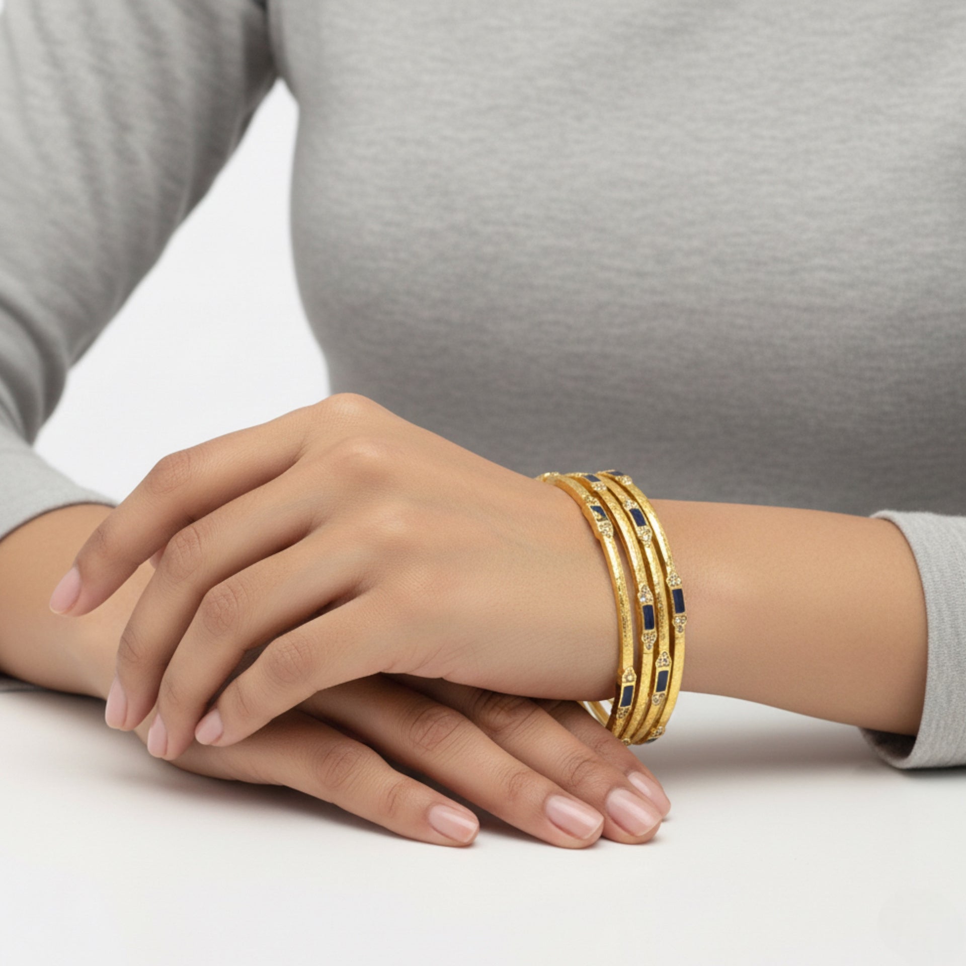 Gemini said Gold-Tone Stackable Bangles with Navy Accents – 2.4