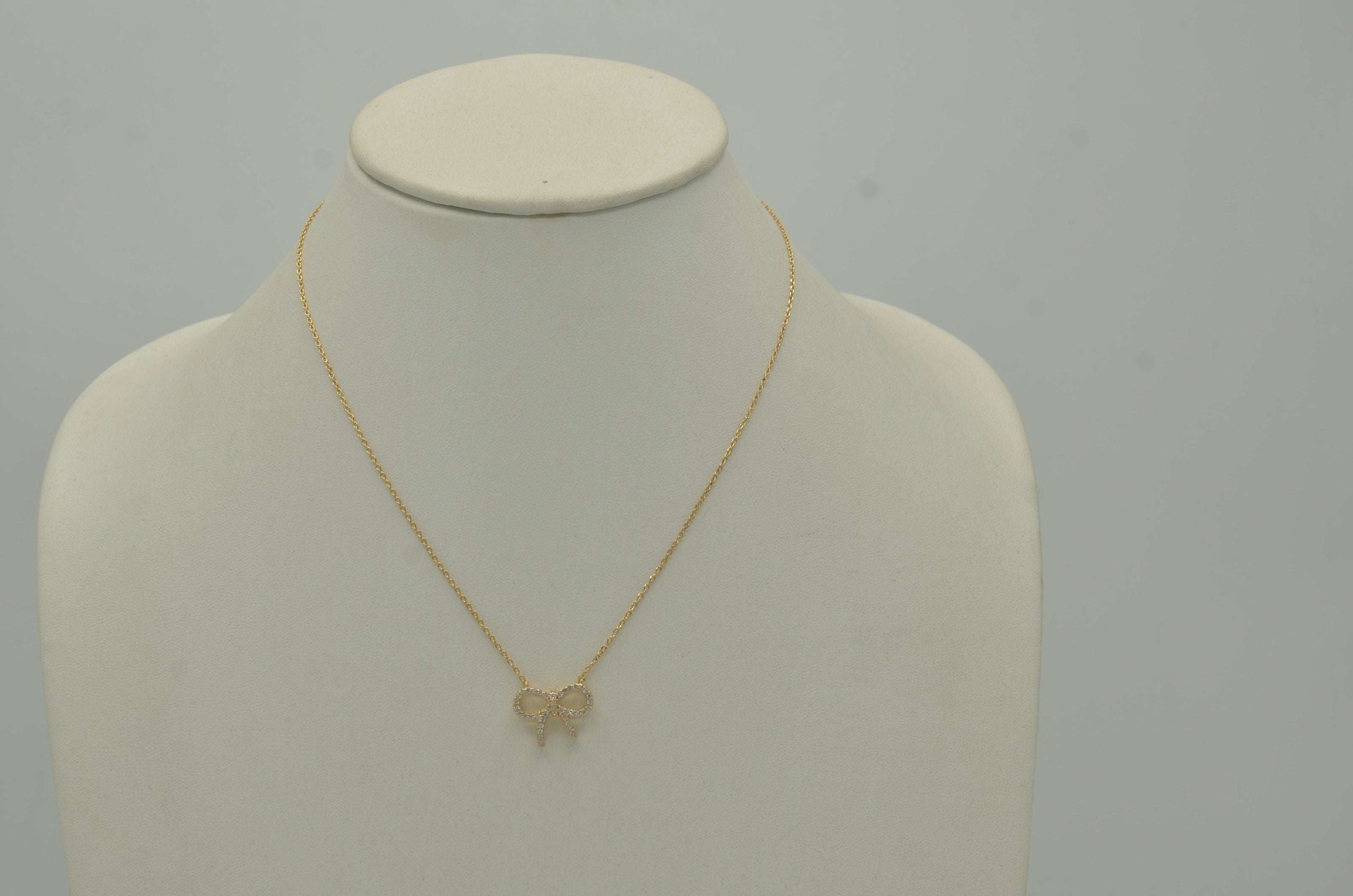 Gold Crystal Bow Pendant Necklace# HNN90868G(SA10)